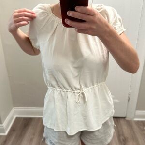 White, babydoll blouse. Perfect for work. New with tags from Ann Taylor.